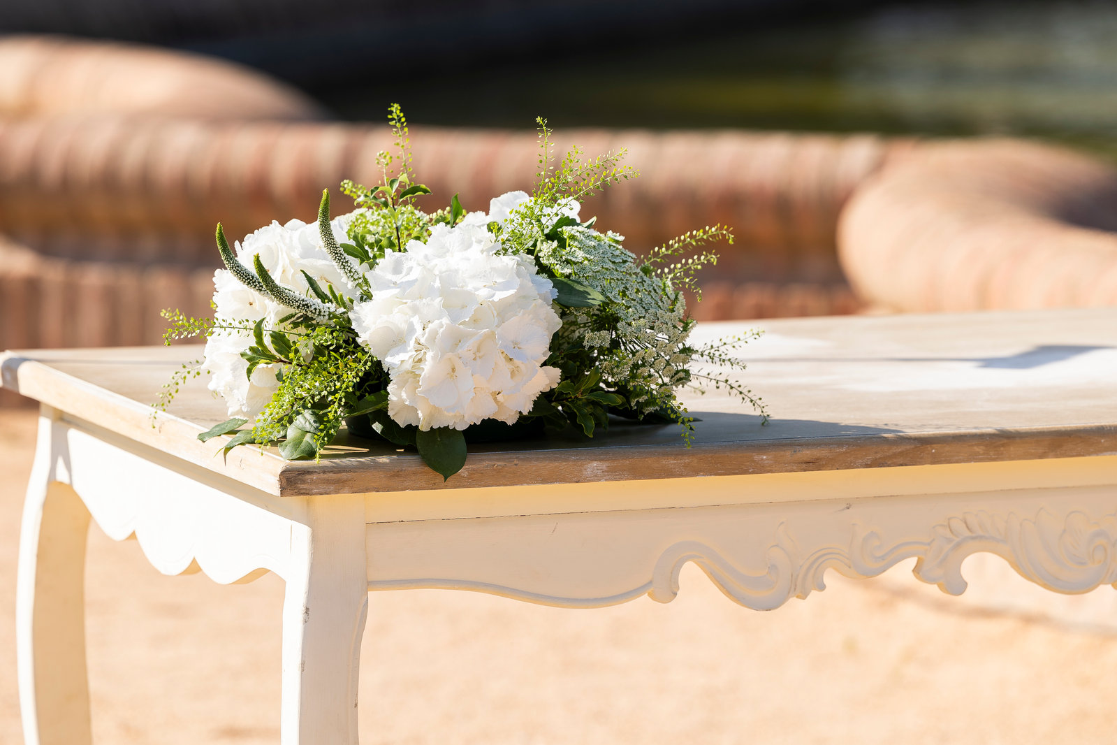 Floral decoration on a poolside table