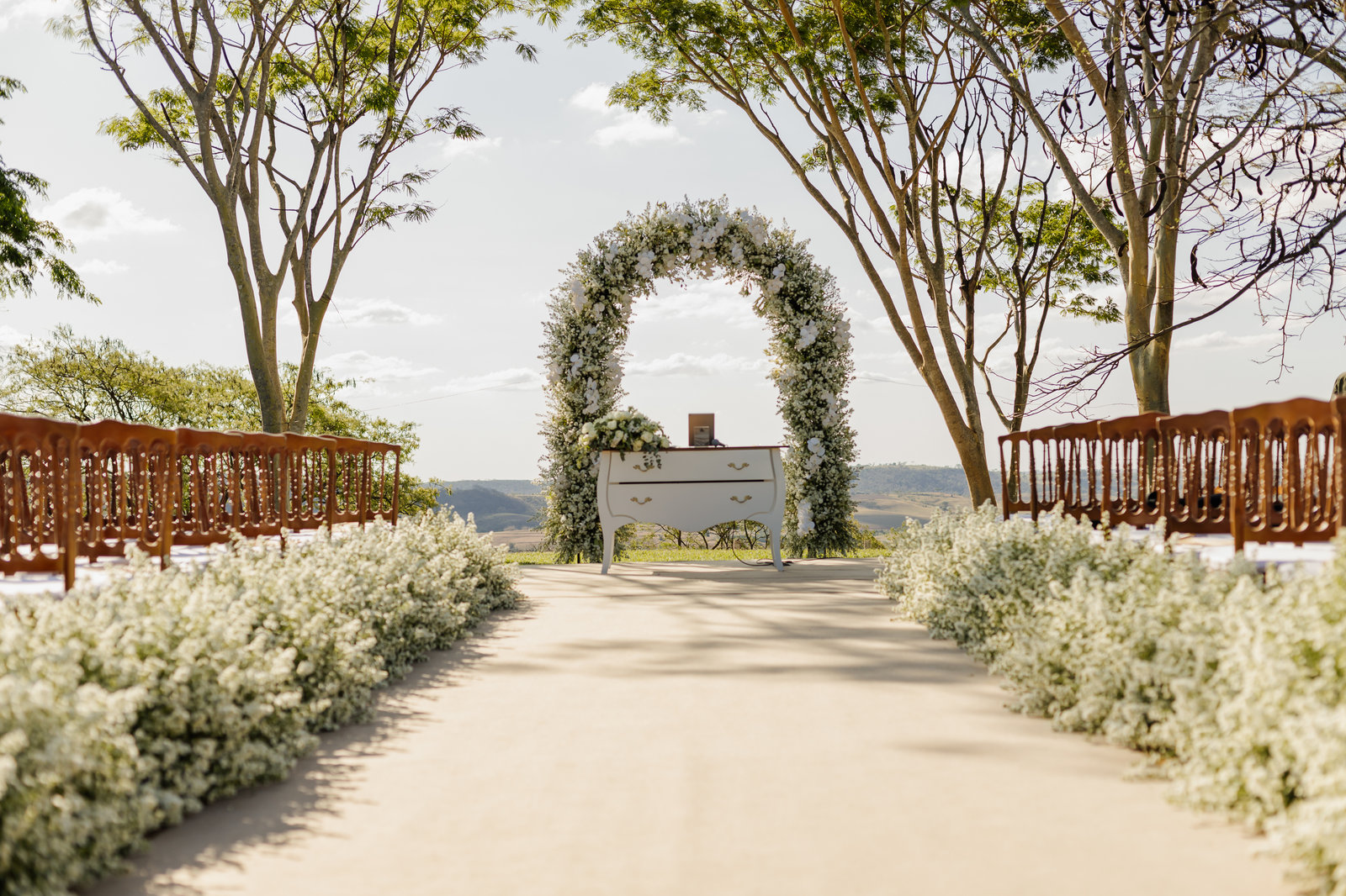 Floral arch at the end of a garden path
