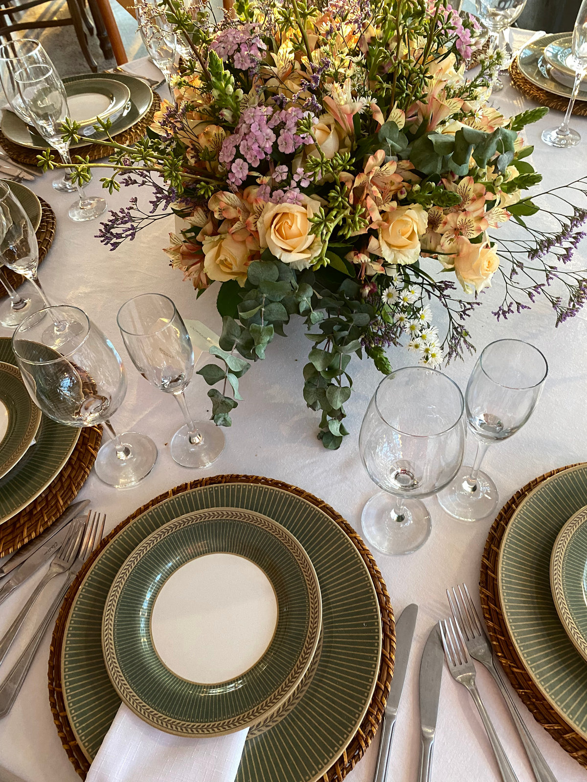 Table setting with flowers and glassware